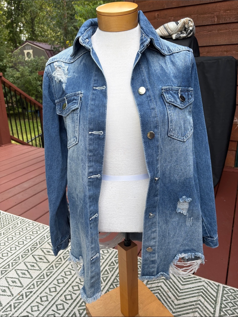 Blue Distressed Denim Jacket with Frayed Hem
